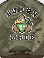 A beautiful front view of the Pokemon x Human Made Satin Bomber Jacket in olive green.