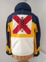 Polo Ralph Lauren Yacht Club Sailing Jacket back view on mannequin showing R9L Snipe Class Division red cross anchor patch navy yellow white colorblock