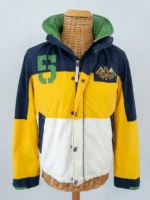 Polo Ralph Lauren Yacht Club Sailing Jacket front view on mannequin navy yellow white colorblock number 5 green applique PRL Club chest badge green lining