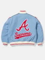 Supreme x Mitchell and Ness Atlanta Braves Varsity Jacket front view powder blue wool Braves chenille script tomahawk patch red star sleeves Cooperstown patch Supreme tab