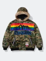 A front profile of the Supreme Mitchell Ness Nuggets Camo Hoodie in a bold camouflage pattern.