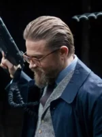 A front view of the Charlie Hunnam The Gentlemen Coat in a sharp dark blue.