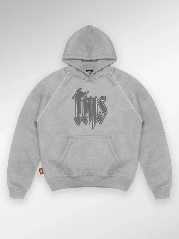 Front presentation view highlighting the deep pocket layout of the TMS Grey Hoodie.