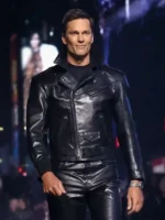 A dynamic view of the Tom Brady Gucci Leather Biker Jacket worn during a high fashion runway appearance.