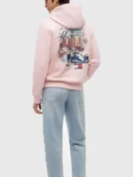 A standalone profile of the vibrant pastel pink Tommy Hilfiger Cadillac F1 Miami Hoodie.