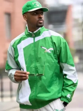 A premium standalone profile presentation of the green and white HOMAGE x Starter Eagles Jacket shell.