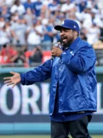 Front studio layout profile highlighting the gleaming finish of the Ice Cube Los Angeles Dodgers Jacket.