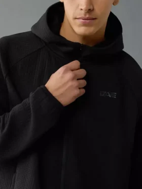 AE 247 Training Zip-Up Hoodie front view showing zipper closure, hood, pockets, and athletic design