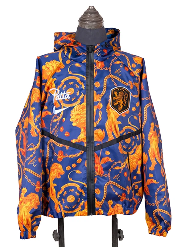 Full front view of the hooded blue FIFA World Cup 2026 Netherlands Anthem Jacket on a mannequin, highlighting the Patta, Nike, and KNVB branding over the orange Dutch icon print.