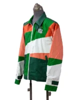 Left-angled view of a multi-colored sporty windbreaker jacket emphasizing the custom embroidered crocodile patches and the adjustable sleeve cuff straps.