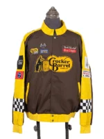 Full front view of the NASCAR Cup Series Cracker Barrel 400 Racing Jacket on a mannequin torso, featuring a brown body, yellow stand-up collar and sleeves, a snap-button wind flap closure, and multiple embroidered chest sponsor badges.