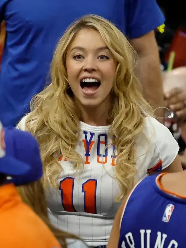 White NBA Finals Sydney Sweeney Knicks Jersey spotted on Sydney Sweeney cheering the Knicks during the NBA Finals