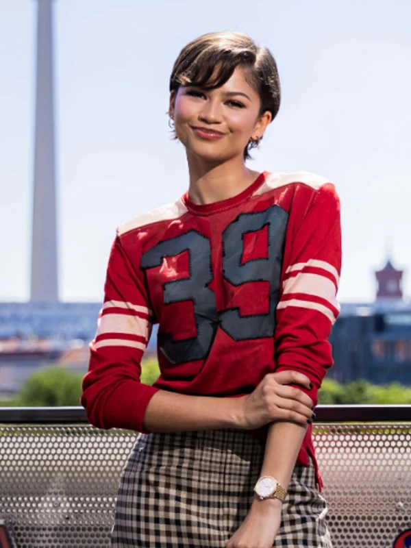 This view presentation highlighting the clean seams and fluid texture of the Spiderman Berlin Photocall Zendaya Shirt.