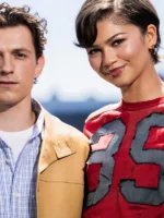 layout view of the vibrant red Spiderman Berlin Photocall Zendaya Shirt highlighting its premium athletic knit.