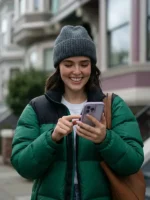 A premium standalone profile presentation of the vibrant green Voicemails for Isabelle 2026 Zoey Deutch Puffer Jacket shell.