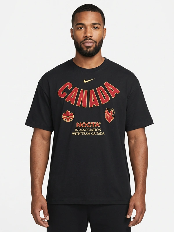 World Cup 2026 Nocta x Canada T Shirt Front presentation layout view highlighting the sharp athletic profile of the black World Cup 2026 Nocta x Canada T Shirt.