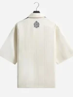 Clean rear profile view showing the tailored sports framing on the back of the Adidas Kith Lionel Messi Football Shirt.