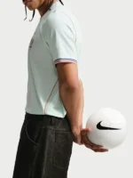 Side profile of the France National Team 2026 Stadium Away Soccer Jersey showing sleeve trim and lightweight polyester fabric.