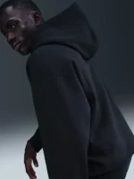Kobe Bryant Mamba Forever Hoodie side profile view showing black premium fleece construction oversized hood and ribbed cuffs