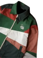 Mauro Garfias x Lacoste Mexico jacket close up showing classic shirt collar silver zipper and white Croc logo in Mexican iconographic style on green panel