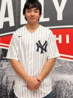 New York Yankees white pinstripe baseball jersey with NY logo worn lifestyle view