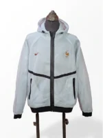 Front view of Nike France mesh anthem jacket with embroidered FFF Coq Gaulois crest and Nike swoosh