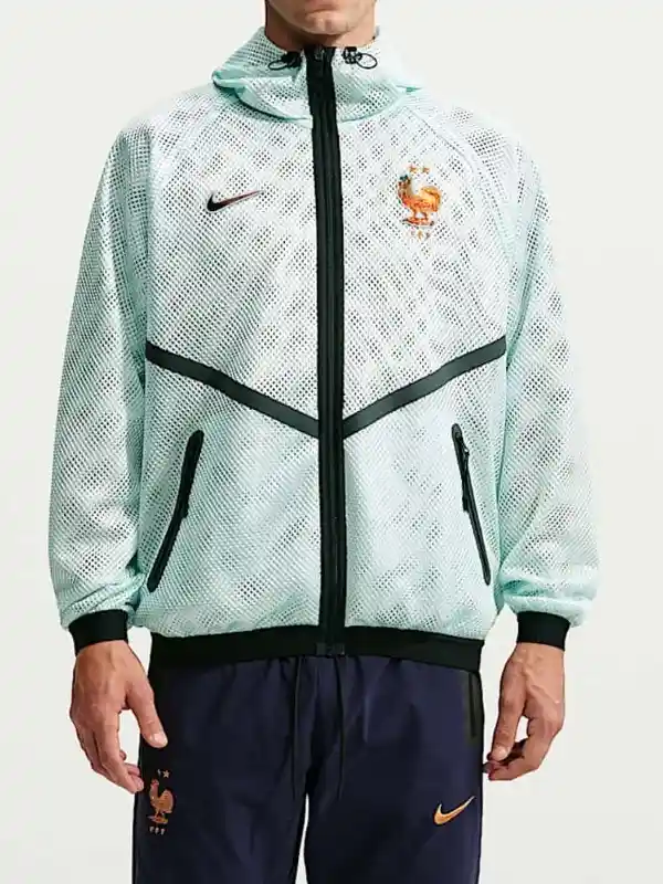 Model wearing Nike France mesh anthem jacket in Igloo mint with matching France training pants