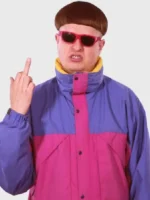 Oliver Tree Alien Boy pink and purple jacket in a studio portrait with retro sunglasses