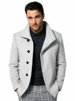 Owain Yeoman Extant wool white coat front three quarter view showing lapel collar and button fastening