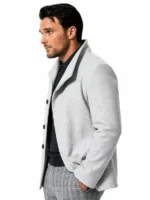 Owain Yeoman Extant white wool coat side profile showing coat length and open hem cuff sleeves