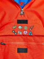 Close view highlighting the premium weave and rich texture of the vibrant Pokemon Hoenn Starter Jacket.