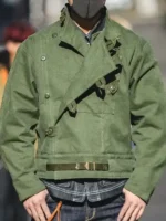 Swedish military motorcycle jacket military green worn showing asymmetric double-breasted front panel belt strap closure and waist buckle