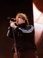 Side view of Adidas Lewis Capaldi Track Jacket featuring sporty styling, clean fit, and premium trackwear finish