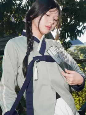 Close-up of BABYMONSTER x YBSY Hwarang Hanbok Jacket in grey highlighting fabric texture and premium details