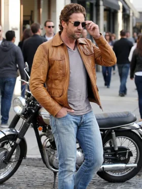 Closure view of Gerard Butler Brown Leather Jacket highlighting the front zipper, neat stitching, and premium brown leather texture