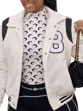 Closure view of LaBrina Jackson Heart and Hustle Houston Varsity Jacket featuring snap button fastening and premium varsity construction
