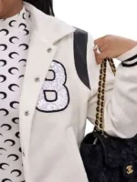 LaBrina Jackson Heart and Hustle Houston Varsity Jacket featuring detailed embroidery, varsity patches, and premium craftsmanship