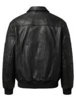 Back view of a black leather bomber jacket showcasing a large, clean-lined spider emblem embroidered into the center, topped by web patterns along the shoulders.