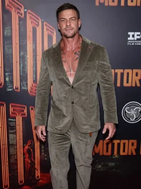 Full-length event view of the Alan Ritchson Motor City olive corduroy jacket and matching regular-fit pants.