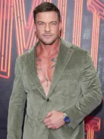 Front worn view of the Alan Ritchson olive corduroy suit with notch lapels, button closure, and chest pocket.