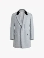 Front view of the heather grey Drew Starkey wool blazer with black velvet peak lapels and flapped waist pockets.