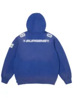 Back view of the blue Supreme Football Jersey hoodie with white shoulder numbers and embroidered star-accented lettering.
